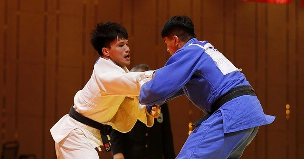 VĐV Lê Anh Tài trong một trận đấu Judo của đội tuyển Việt Nam